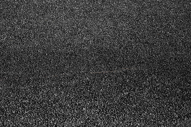 istock New black asphalt immediately after asphalting 477400632
