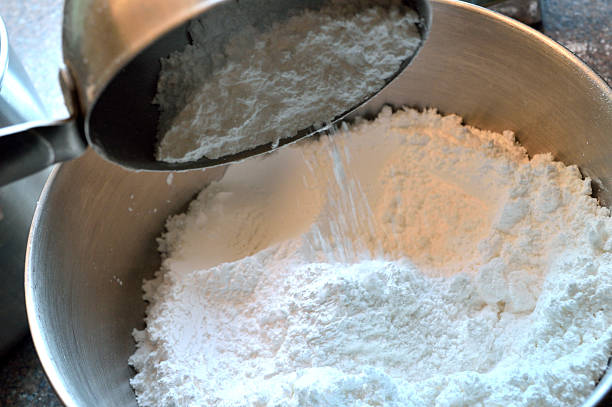 istock Measuring and pouring confectioner's sugar 477401948