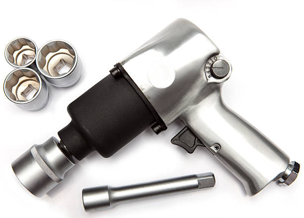 air impact wrench and edge heads on white background stock photo