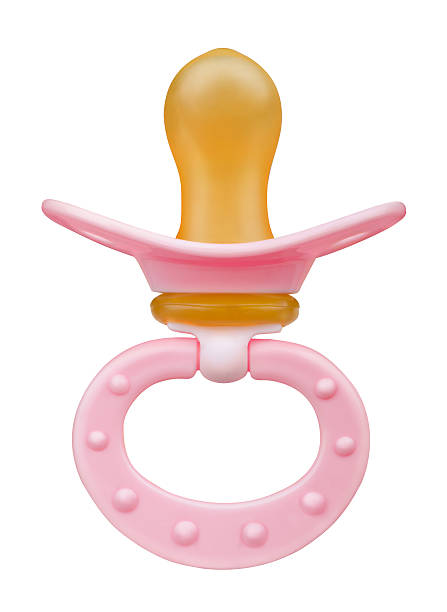 Pacifier Pink baby's pacifier isolated on white sooth stock pictures, royalty-free photos & images