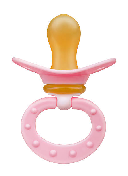 Pacifier Pink baby's pacifier isolated on white definition of pacify stock pictures, royalty-free photos & images