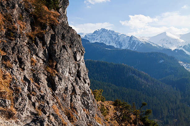 istock Mountain snowy landscape with rock 477403732