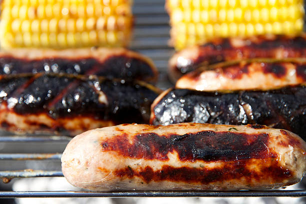 istock An English Barbecue, basic BBQ grill at home with sausages 477404118