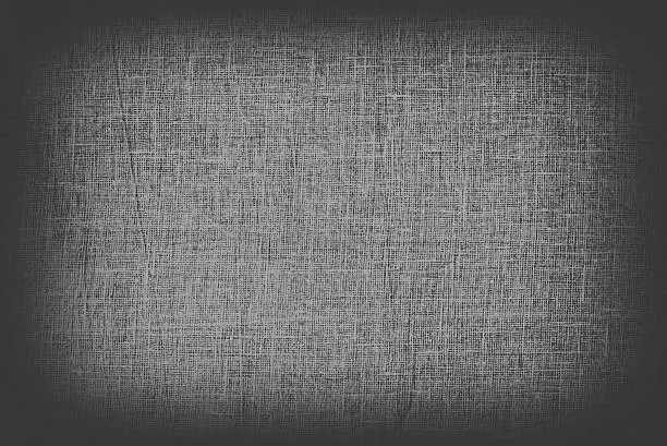 Photo of dark textile texture as background