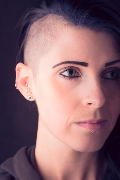 istock Woman With A Part-shaved Head 477404366