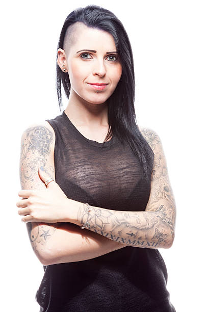 istock Woman With A Part-shaved Head And Tattoos 477404412