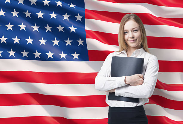 istock business lady in a white shirt with a black folder 477404812