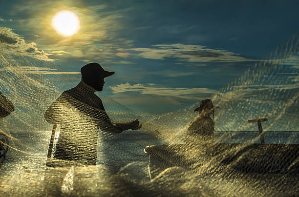Fishermen in the morning mesh ominous Binh Thuan sea, Vietnam - June 4, 2014: A man carving the grid when the sun's rays on a morning at sea, Binh Thuan, Vietnam commercial fishing net photos stock pictures, royalty-free photos & images