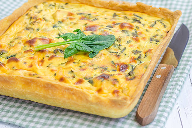 istock Ricotta spinach pie on the wooden table, closeup 477412132