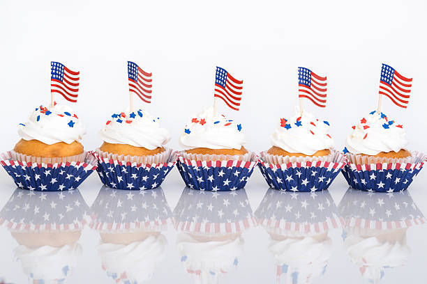 istock Patriotic cupcakes with sprinkles and American flags 477413994