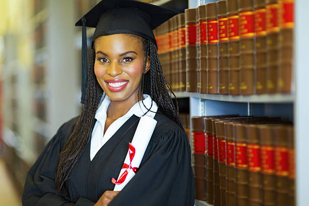 istock african female graduate in library 477414059