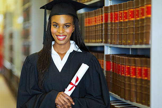 istock pretty african american college graduate 477414085
