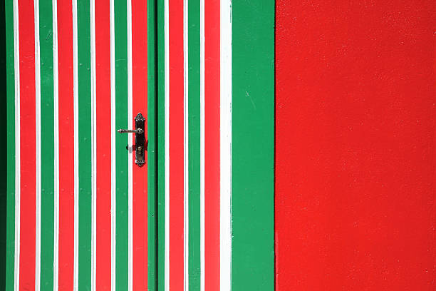 istock Red door and green lines 477414689
