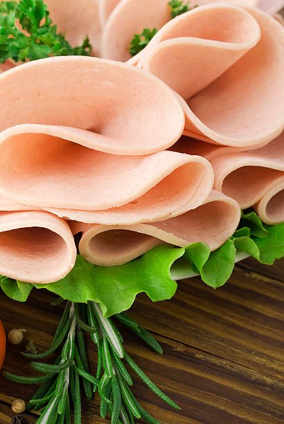 istock Fresh ham slices with lattuce and cherry tomato 477415441