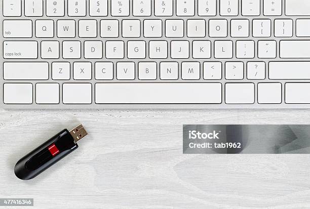 Desktop With Keyboard And Data Thumb Drive Stock Photo - Download Image Now - 2015, Bright, Business