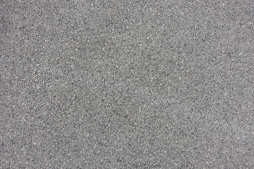 background texture of rough asphalt road with white line