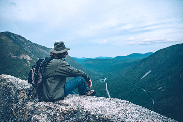 Man overlooking Crawford Notch in New Hampshire