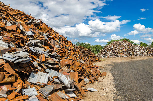 Scrapheap metal piles stock photo