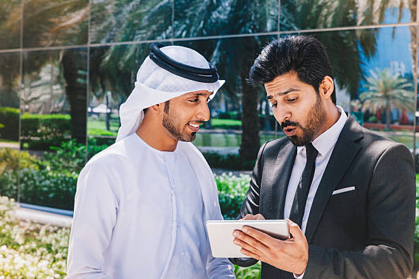 istock Arabian Businessmen working with Digital Tablet Outdoor 477419936