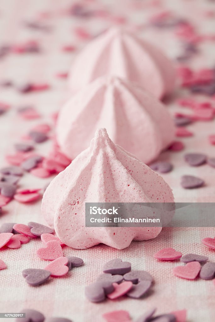Pink meringue Close-up of delicious pink meringue. Studio shot. Baked Pastry Item Stock Photo