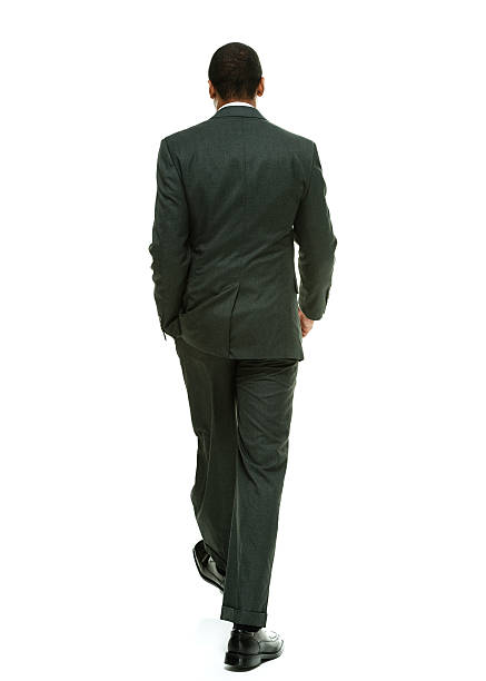 istock Rear view of businessman walking 477423222
