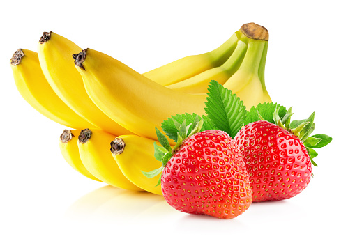 Strawberries and banana isolated on the white background.