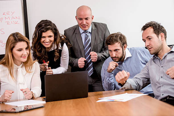istock Watching Football in Office 477428652