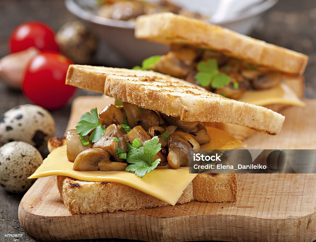 Toast sandwich with mushroom, cheese and parsley, selective focus Appetizer Stock Photo