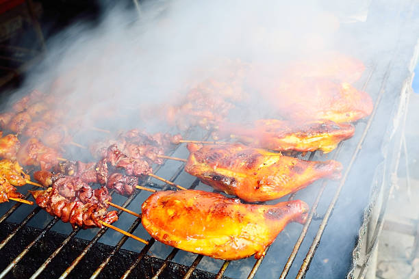 istock Grilled Barbecue Chicken with Full of Smoke 477429086