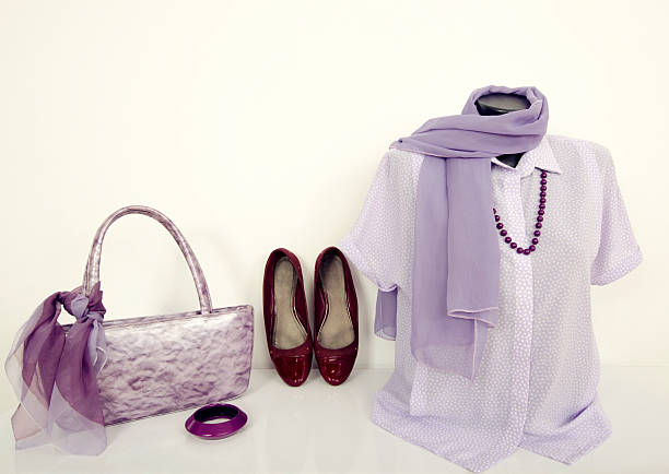 istock Purple shirt on mannequin with matching accessories. 477429624