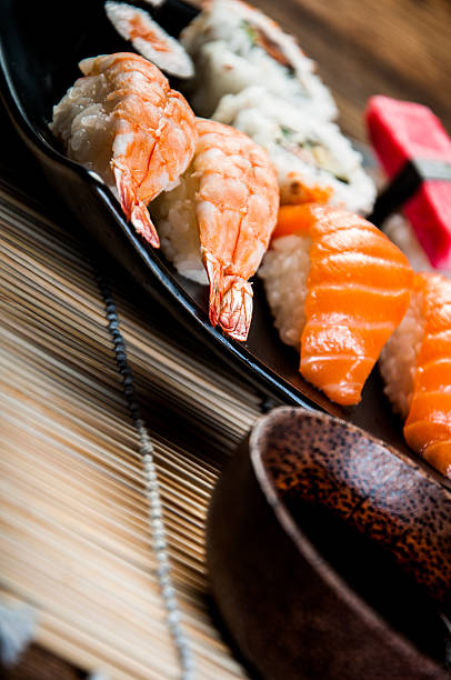 istock Japanese composition with sushi on the wooden table 477429829