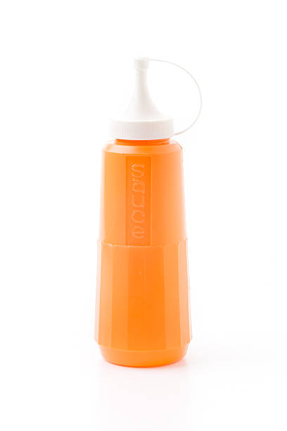 istock bottle of chili sauce isolated 477430066