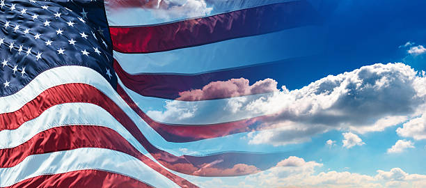 istock us national flag waving on the wind 477430442