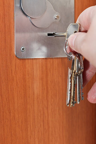 istock opening door by bunch of keys 477431335