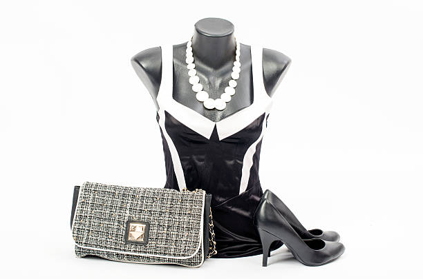 istock Black and white dress on mannequin with matching accessories. 477433656