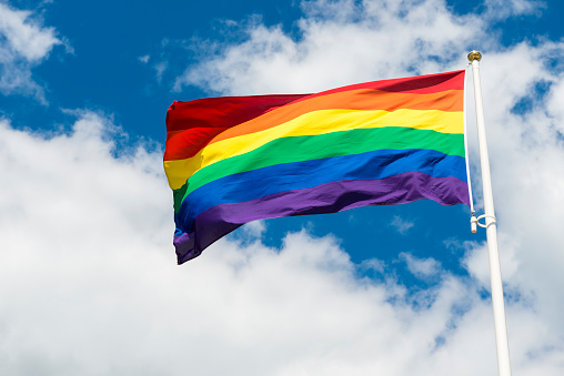 Pride flag. HBTQ flag. Rainbow flag. Fluttering in the wind