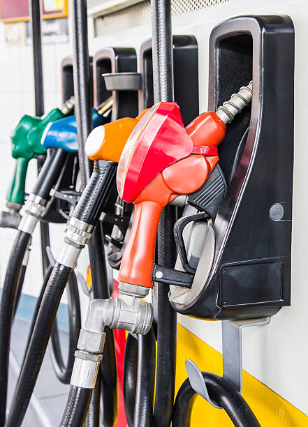istock Petrol pump filling 477434475