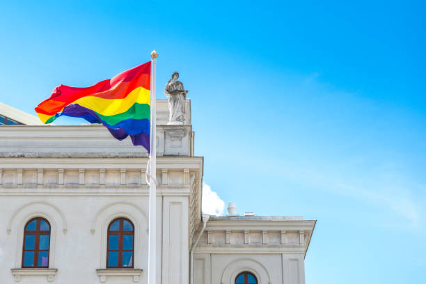 istock Rainbow flag and old theatre building 477435080