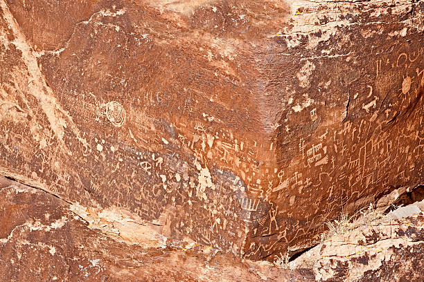 istock Ancient symbols, real texture in stone, USA 477435329