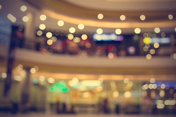 istock Blurred image of shopping mall and bokeh background. 477435704