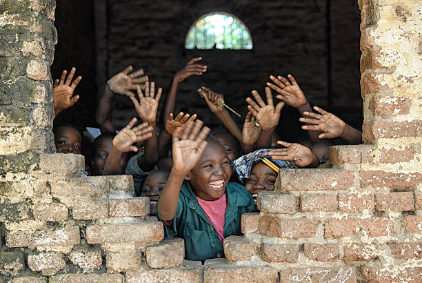 Children say hello from african school stock photo