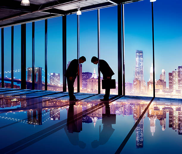 istock Japanese Businessmen Having a Business Agreement 477438706