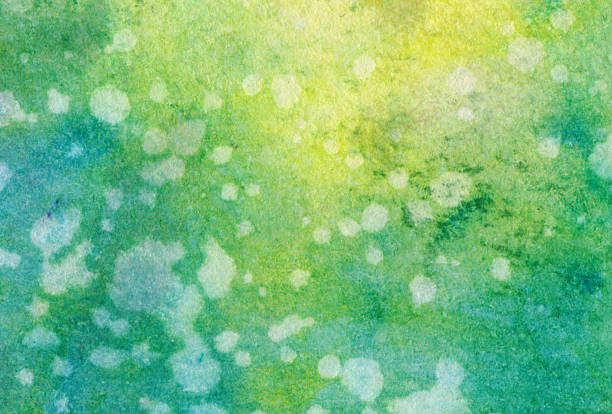 istock Spots on shades of green and yellow inks 477438774