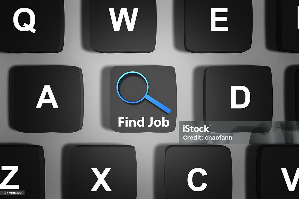 Job Search! "find job"(with magnifying glass icon) button on a keyboard platform. 2015 Stock Photo