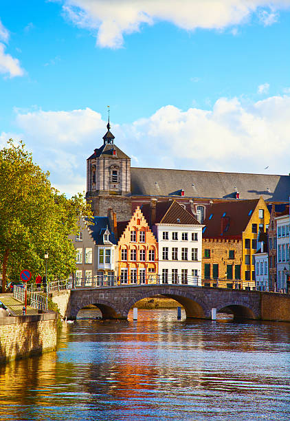 istock Old buildings behind the bringe in sunny autumn day 477440501