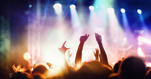 istock People at concert party. 477440668