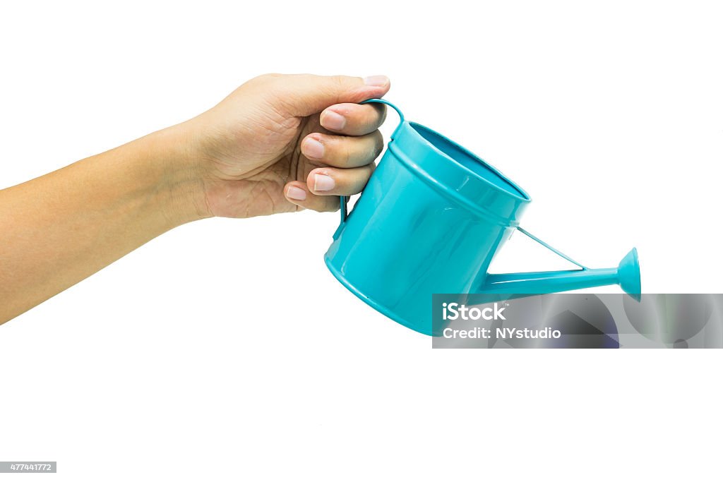 hand with blue watering can isolated on white background Watering Can Stock Photo