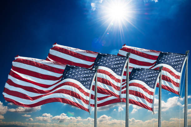 istock us national flag waving on the wind 477442074