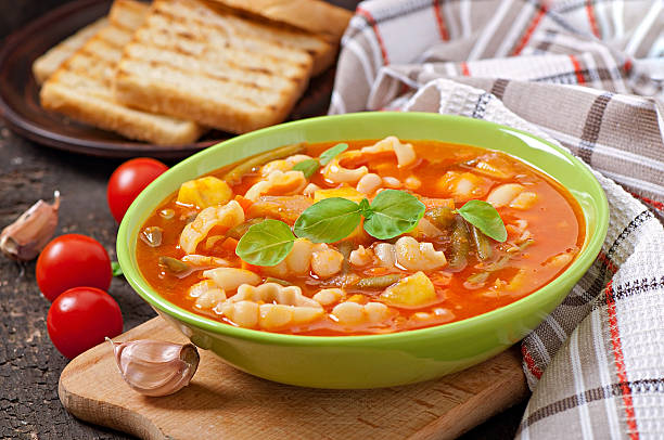 istock Minestrone, italian vegetable soup with pasta 477444635