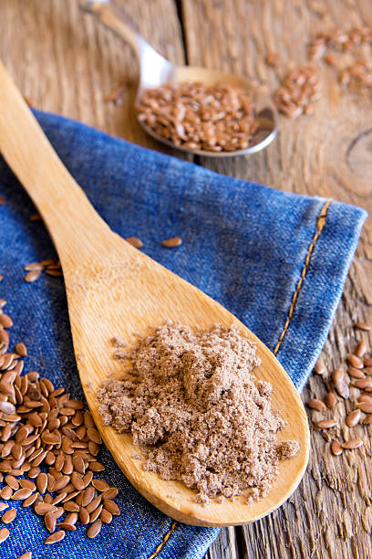 istock Flax powder and seeds 477445272